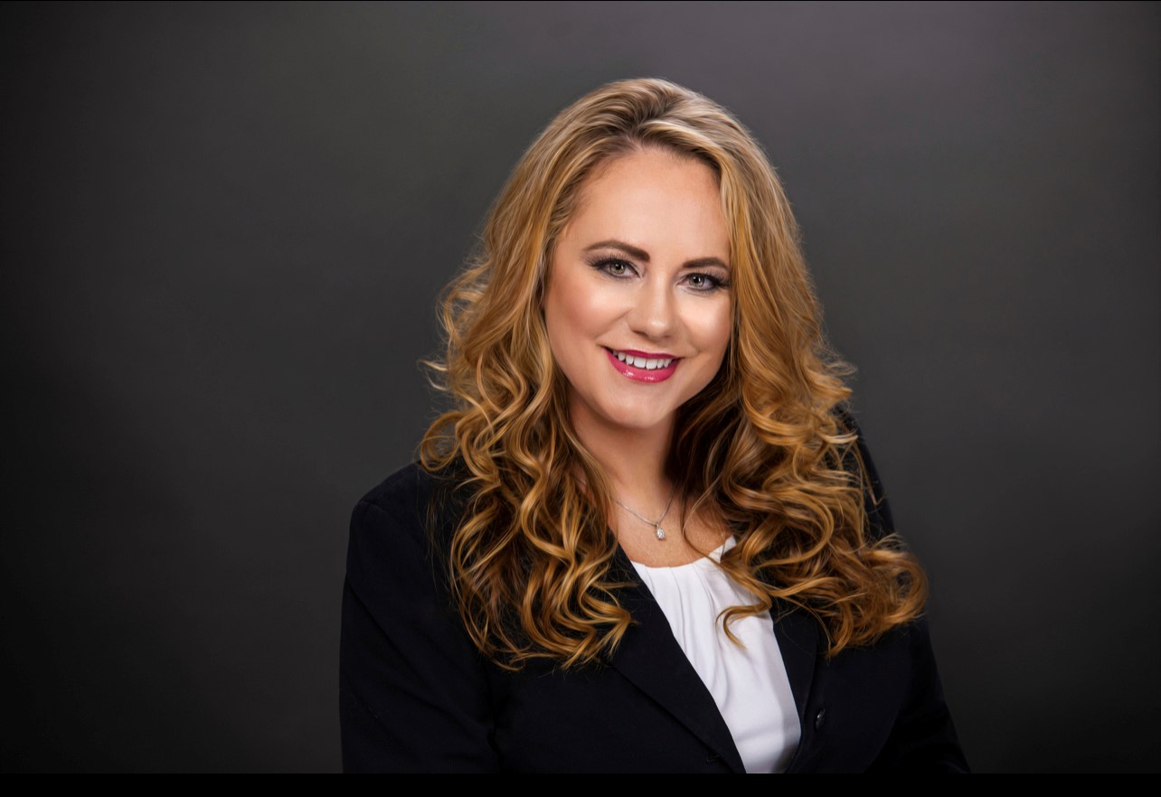 Brandy Leidgen headshot at Bi-Bett