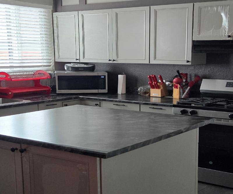 Residential perinatal kitchen area - island in the center