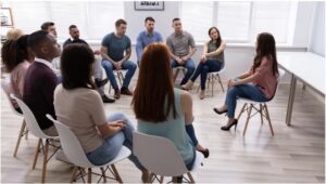 Group therapy session in a circle at a residential treatment facility
